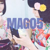 two women in traditional japanese clothing eating ice cream