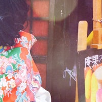 a woman wearing a colorful kimono